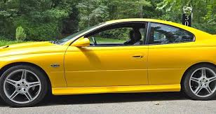 Image result for Yellow 2004 Pontiac