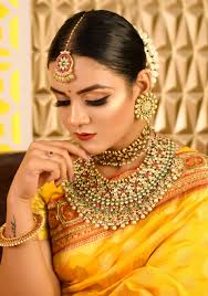 The Drape Of Yellow Banarasi Saree The Gorgeous Look The Gaze Of Gold Embellished With K Indian Bridal Makeup Bridal Hair And Makeup Indian Actress Images