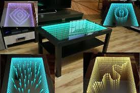 Each decorative cocktail table measures 42w x 42d x 17h, weighs 126 lbs and is controlled using a 3w led strip with an on/off switch. Black Table Led 3d Coffee Table Illuminated Infinity Mirror Effect Remote Rf Ebay