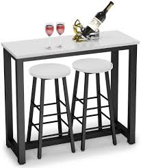 Round pub dining table set with napoleon stools's chair backs brings a standout detail to its classic design. Buy Tribesigns 3 Piece Pub Table Set Counter Height Breakfast Bar Dining Table With Stools Set For Kitchen Dining Room Living Room Small Space White Online In Turkey B07zqbgrsm