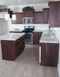 They look fantastic with all modern designs. Brown Kitchen Cabinets With Grey Floors Anipinan Kitchen
