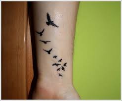 Since bird tattoos can be scaled down to consider a small design below your collarbone or a larger one on your lower chest area. Pin On Tatspiration