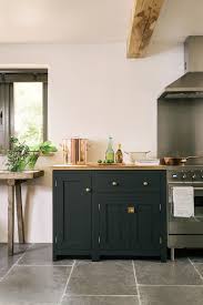 Pantry Blue Devol Shaker Cabinets Brass Door Furniture And A Beautiful Worn Grey Limestone Flooring From Small Kitchen Furniture Devol Kitchens Shaker Kitchen