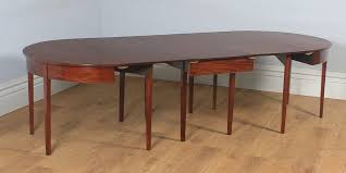 12 Classic Dining Tables You Re Going To Love 10 Person Dining Table Dining Table Circular Dining Table