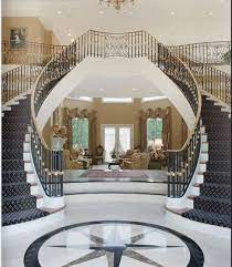 The Inlaid Marble Invites You Into A Magnificent Entrance Which Features A Stunning Curved Double Staircase In Staircase Design House Entrance Luxury Staircase