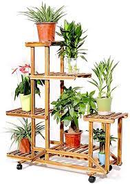 Amazon Com Wooden Plant Stand With Wheels Multi Layer Rolling Plant Flower Display Shelf Indoor Movab Wooden Plant Stands Plant Stand With Wheels Plant Stand