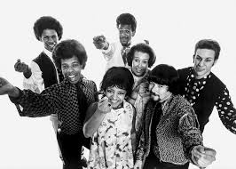 And wilson and his brother ronnie displayed confidence and charisma onstage, dancing in tailored collarless suits with matching coats. Sly And The Family Stone Wikipedia