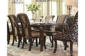 The Valraven Dining Room Extension Table Invites You To Feast Your Eyes On A Mag Dining Room Furniture Sets Ashley Furniture Dining Set Ashley Furniture Dining