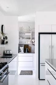 White Magic Adore Home Magazine House And Home Magazine Sleek Kitchen Decorating Above Kitchen Cabinets