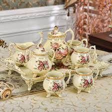 Find More Coffee Tea Sets Information About Yolife British Royal Ceramic Ivory Porcelain Coffee Sets 8pcs Tea Cup Mug Tray Tea Pots Tea Sets Vintage Tea Cups
