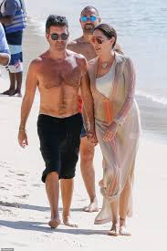Simon was a judge on x factor uk back in 2010 when harry auditioned. Simon Cowell 60 Displays His Slim Physique As He Joins Lauren 42 For Beach Stroll In Barbados Express Digest