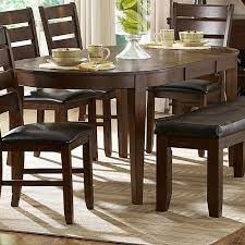 Substantial turned legs and a chamfered table edge make this table beautiful as well as functional. Ameillia Oval Dining Table W Butterfly Leaf Homelegance 2 Reviews Furniture Cart
