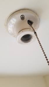If you read in bed before going to sleep and don't want to keep getting up to turn a light on the ceiling on and off, it is easy to add a pull chain to the fixture. Pull Switch Wikipedia