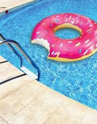 15 Novelty Pool Floats In Increasing Order Of Ridiculousness Donut Pool Donut Pool Float Cool Pool Floats
