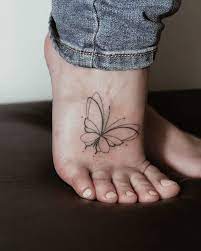 Butterfly Tattoo On The Right Foot Foot Tattoos Unique Butterfly Tattoos Butterfly Tattoo
