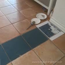 If you're planning to paint the trim of the room, line the walls with painters tape. Annie Sloan Chalk Paint Aubusson Blue Annie Sloan Chalk Paint Aubusson Blue Annie Sloan Painting Tile Floors