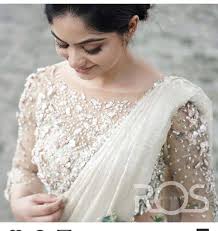 Pin By Aswany Mohan On White Bridal Saree Wedding Dress Long Sleeve Half Saree Designs Wedding Dresses