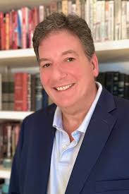 Sometimes we spot a debut novel that has all the earmarks of success. We  were intrigued to learn Gary Minder was available to introduce his new  book, The Education of Asa Paxton,