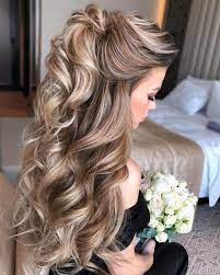 Loose waves topped with a botanical crown is a classic boho wedding hairstyle for good reason. Curly Down Wedding Hairstyles Image Uiowa Foundation Wedding