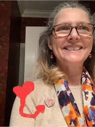 Auxiliary members from the Hearts Museum in their red.