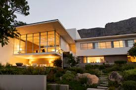 Usually, a modern garden places more focus on the architecture and materials than on the plants and greenery. Landscaping In Front Yard Of Modern House Stockphoto