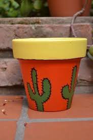 Pin By Angelica Campos On Ceramic Painting In 2020 Decorated Flower Pots Clay Pot Crafts Painted Plant Pots