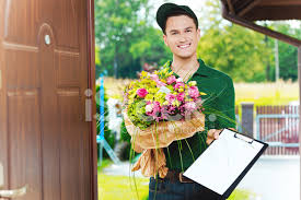 Find the most exquisite range of gifts for male friends. Delivery Man Delivering Flowers Stock Photos Freeimages Com