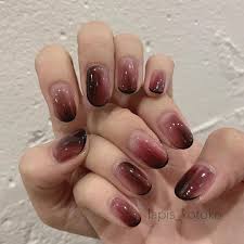 image may contain one or more people closeup and outdoor gel nails swag nails neutral nails