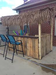 Diy Tiki Hut Made From Recycled Materials This Project Costed Less Than 200 Tiki Hut Outdoor Decor Backyard Diy Outdoor Bar