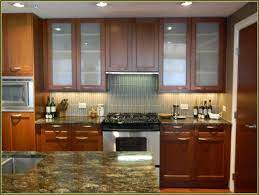 Using glass for kitchen cabinet doors allows you to get that happy medium between having a solid wooden door and completely open shelving. Kitchen Cabinets Glass Doors Lowes Glass Kitchen Cabinet Doors Upper Kitchen Cabinets Replacement Kitchen Cabinet Doors