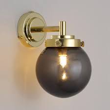 If a brighter light is wanted, i suggest getting at 1000bulbs.com we chose to use the provided bulb, as it lends a good ambience to the small room. Small Glass Sphere Wall Lamp With Dark Smoked Glass O 12 Cm Casa Lumi