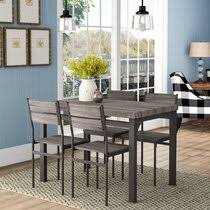 Opt for a cool gray instead of white if you want a color that will add a little depth to your space, but won't take away from the bolder colors in your room. Grey Kitchen Dining Room Sets Tables You Ll Love In 2021 Wayfair