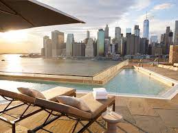 The rooftop pool is heated, so this urban oasis is open for swim and cocktails year round.and while dipping and enjoying drinks in the comfy loungers, you can also take in the amazing views of hudson river and downtown new york. Best Hotel Pools In New York City Conde Nast Traveler