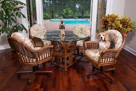 Congratulations on your new sunroom, or deciding to redo your existing room with new sunroom furniture.we at wicker paradise can help you choose furniture design ideas for the sunroom of your dreams with many exotic looks of wicker, rattan, abaca, or seagrass furniture.sunroom decorating has never been easier with wicker furniture, rattan and woven seagrass, all natural renewable materials. Bridgeport Rattan Dining Table With Glass Top In Sienna Stain From Alexander And Sheriden American Rattan