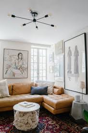 This walnut wood coffee table is a perfect way to display collections of seashells, beach glass, jewelry, minerals, stones and other memorabilia, natural or manmade. Before And After Greenwich Village Apartment Eliza Kern Design