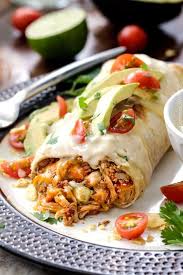 Shredded Chicken Burritos Aka Skinny Chimichangas Are Better Than Any Restaurant Without All The Calori Chicken Burritos Burritos Recipe Mexican Food Recipes