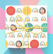 Wraps an object in festive paper. Blue Rainbow Photo Birthday Wrapping Paper Funky Pigeon