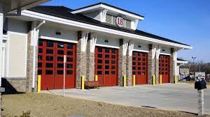 Four Fold Fire Station Doors Installed By Overhead Door Company Of Washington Dc Overhead Door Overhead Door Company Commercial Overhead Door