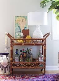 How To Style A Bar Cart In The Living Room Gold Bar Cart Wicker Bar Cart Bar Cart Decor