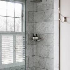 The variety of tile that make up this shower is impressive and interesting. Tiled Shower Ceiling Design Ideas