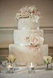 Soft And Neutral Wedding Cake With 3 Layers And An Elegant Design Ivory Wedding Cake Lace Wedding Cake Lace Weddings