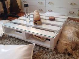 Coffee table with an industrial style due to the four big wheels recycled from a. One Whole Pallet Coffee Table