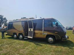 Image result for Dark Chamois 1981 Motor Home