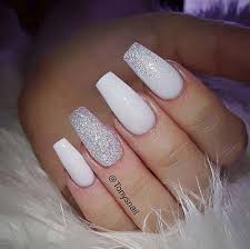 Coffin nails, which are also called ballerina nails, can appear incredibly elegant, especially when partnered with a sophisticated design. Nail Art Ideas For Coffin Nails All Powder White Easy Step By Step Design For Coffin Nails Includin White Acrylic Nails White Glitter Nails Sparkly Nails