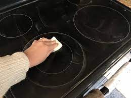 13 Easy Ways To Clean Your Glass Cooktop That Actually Work Glass Cooktop Cleaning Glass Cleaning Flat Top Stove