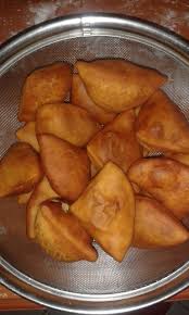 Coconut buns mandazi kenyan doughnuts 6 pour batter in the cake pop machine 7 bake until golden brown tip pour batter right to the lip to get nice and round shapes. Pin On East African Cuisine
