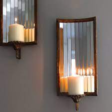 Our battery operated candle wall sconces make use of an amber led light to recreate the warm glow of candlelight, right down to the flicker of lit candles. Venetian Wall Candle Holder Wall Candle Holders Candle Wall Sconces Wall Candles