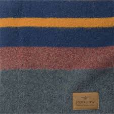 Camp blankets were first designed to meet the rigorous demands of the wild and untamed pacific northwest and were a favorite of early sheepherders. Pendleton Mineral Umber Yakima Twin Camp Blanket Dandy Fellow