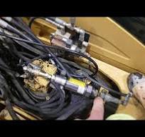 checking travel motor case drain on an excavator. troubleshooting weak  travel