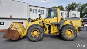 Image result for Komatsu Dark Yellow 2000 Fleet